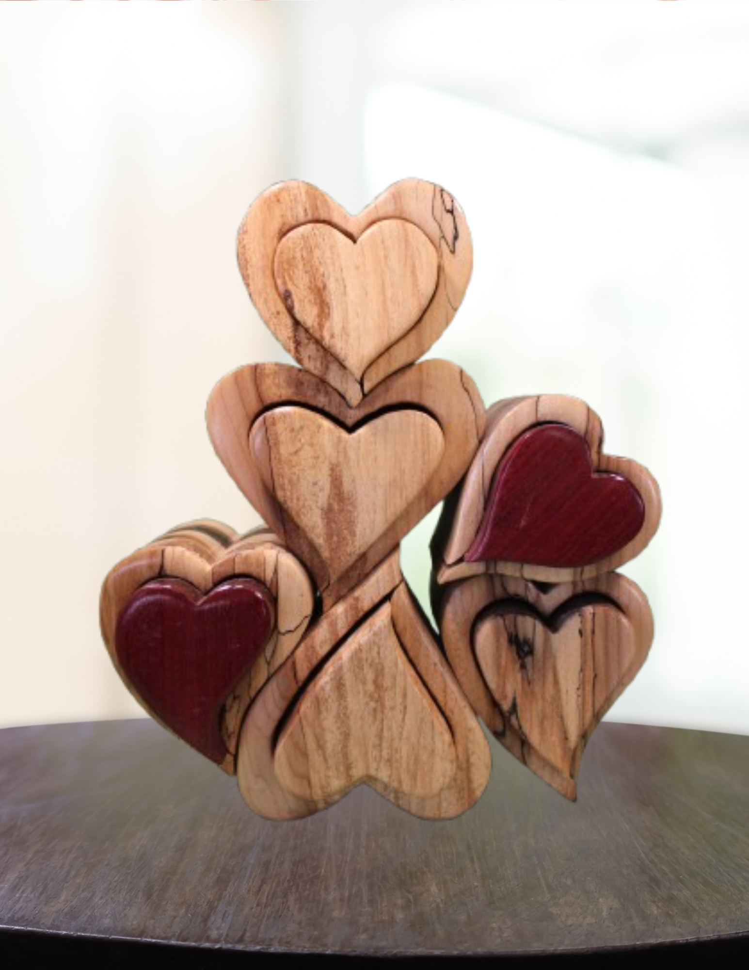 Wooden heart-shaped puzzle on a reflective surface with a white background