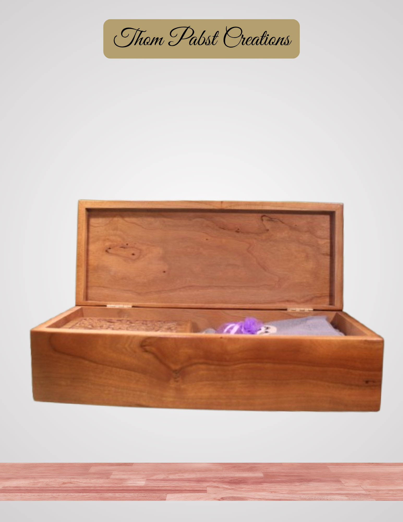Wooden box with a purple flower on a white background, branded 'Thom Pabst Creations'.