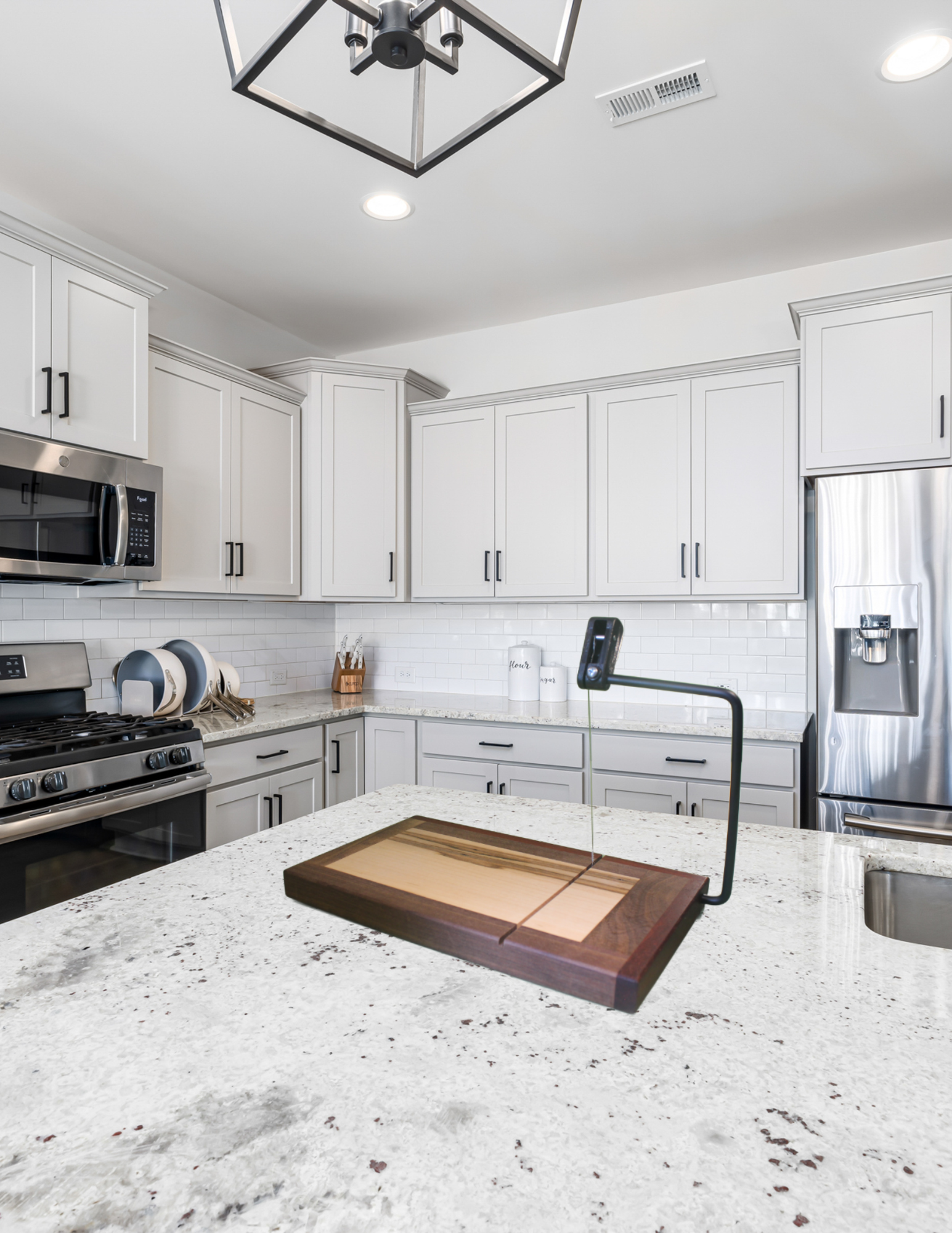 Cheese Slicer in modern kitchen setting. Good for cheese, fruits, vegetables and more.