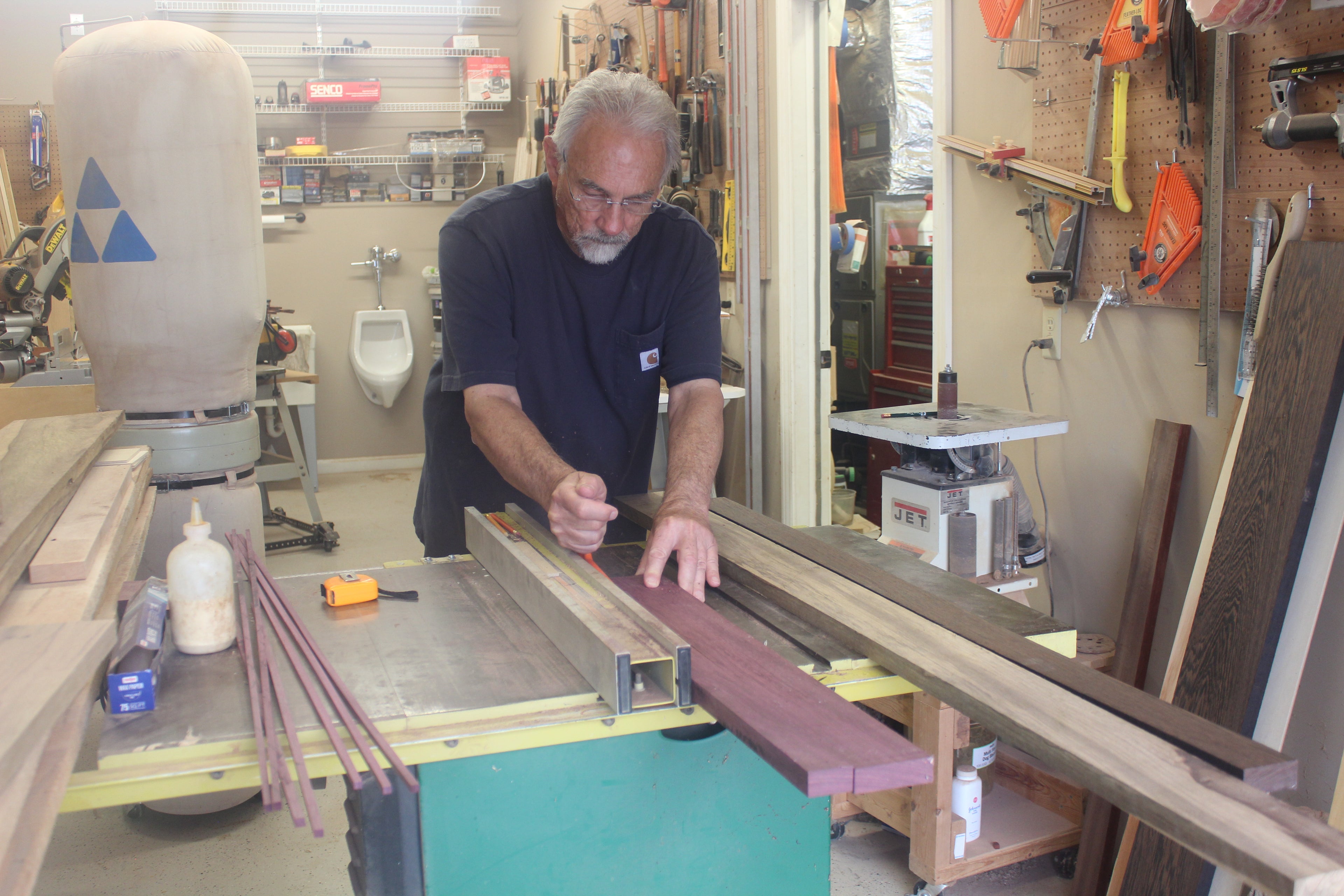 Thom Pabst cutting exotic wood for a one of a kind wood working piece. 