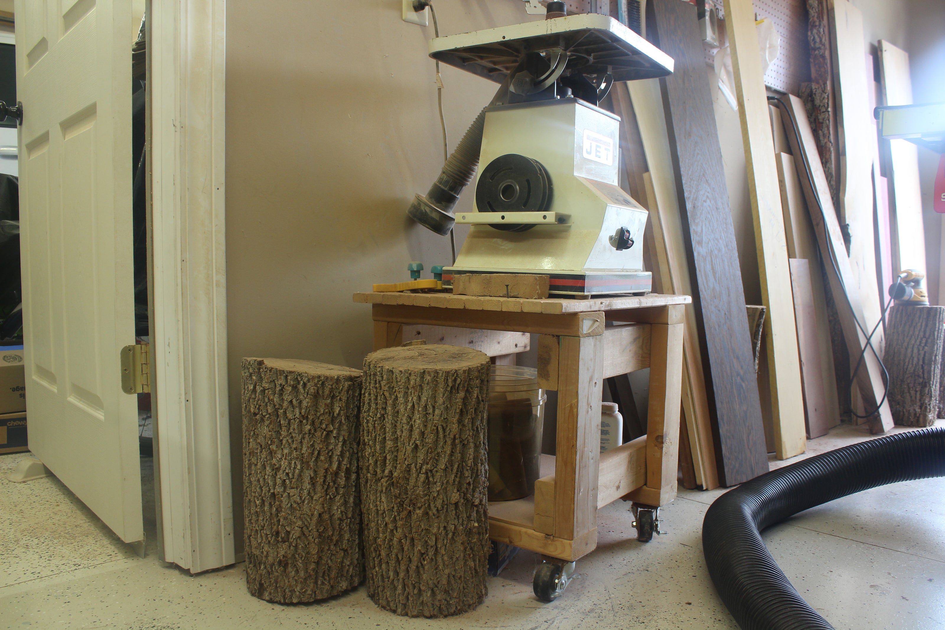 Huntertown, Indiana woodworking shop with camera looking at wooden pieces.
